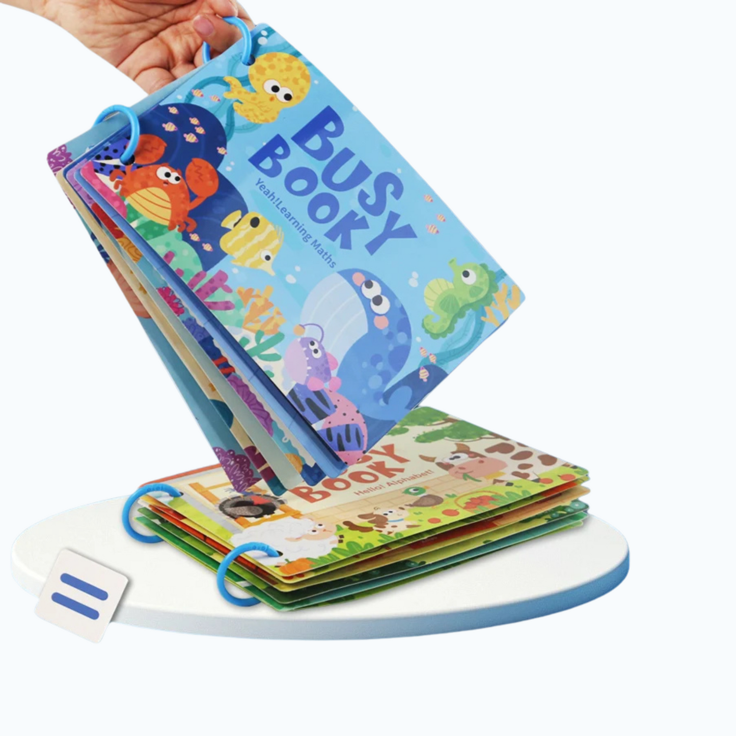 Toddler engaging with a Montessori Busy Book, developing fine motor skills using velcro stickers