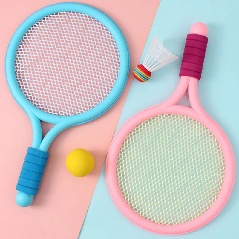Two children’s rackets laid side by side with matching play ball and shuttlecock